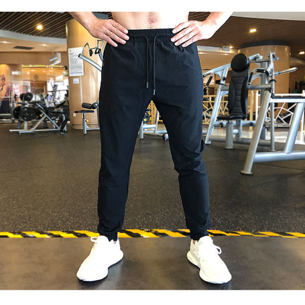 Бег Sweatpants Casual Super Stretch Breathable Sweat Absorbent Quick Dry Drawstring Pants Trousers Long Pants S-XXXL Men 80% Nylon 20% Spandex [No Text Packaging].